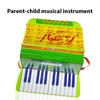Kép 6/11 - Mini 24 gombos 12 basszus harmonika ABS anyag csattal, hangszer kezdőknek - Zöld