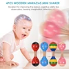 Kép 6/8 - Fa Maracas, Mini Shaker baba csörgők gyerekeknek, aranyos színes hangszeres játékok - 4dbs