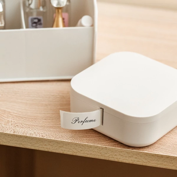 AIMO Q30 feliratozógép mini zsebes hőcímkenyomtató - 1 db címketekerccsel